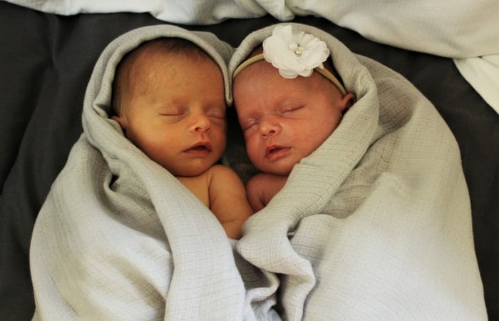 newborn tubal reversal twins in blanket