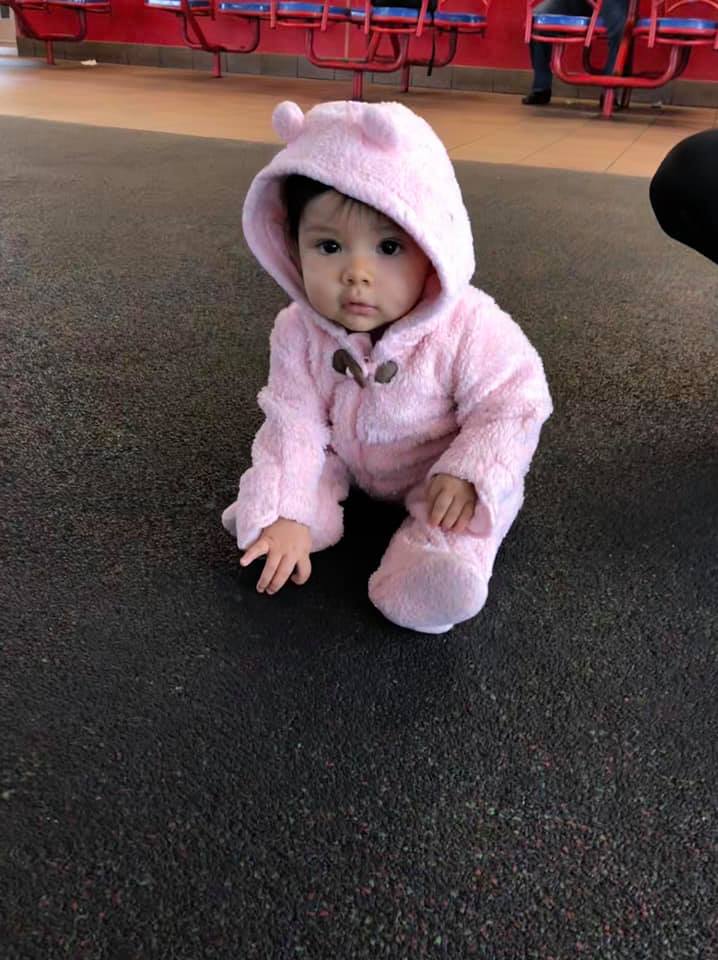 jubentina milla's second tubal reversal baby sophia in a pink jacket at 7 months of age