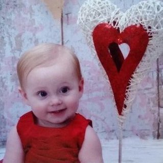 Roxie & Brandy Simmons' tubal reversal baby daughter on her first valentines day