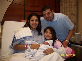 the ybarra family with their newborn tubal reversal baby