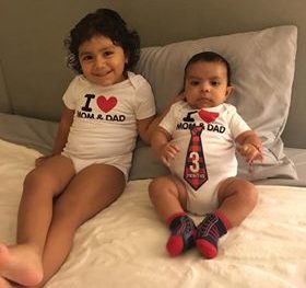 mari and juan gomez share a picture of their 2 tr babiies