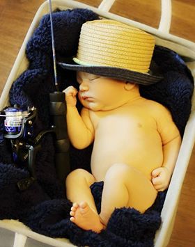 nora knight had her fifth child sebastian keith who is a tubal reversal baby. He is dressed in a top hat.