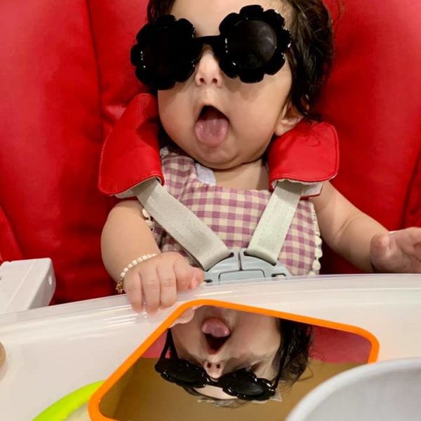 jenn pena's 6 month old baby she had after tubal reversal wearing funny black sunglasses
