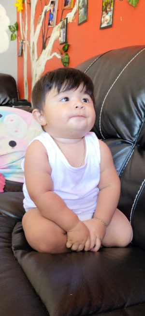 ada hernandez's tubal reversal baby adrian seated on his knees
