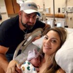 brandy allen and husband with newborn tubal reveresal baby while in hospital